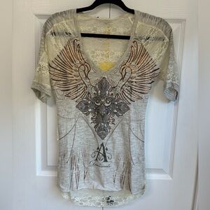 Angel and Diamonds Cream Lace-Back V-Neck Tee with Metallic Wing Graphic